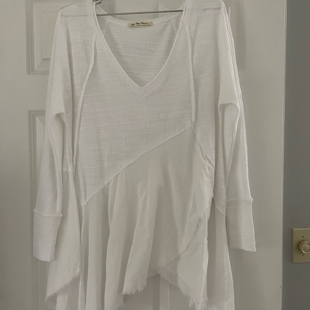 New without tags, never worn.Free People White top.